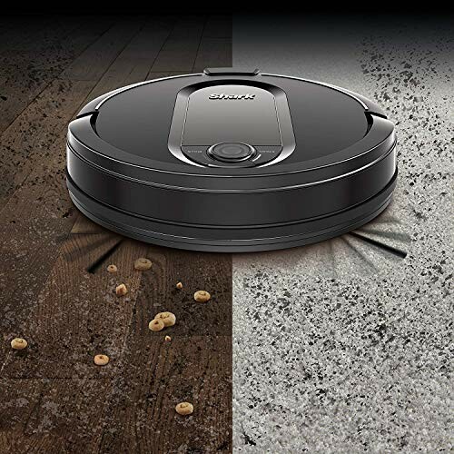 Robot vacuum cleaner on wood and carpet flooring